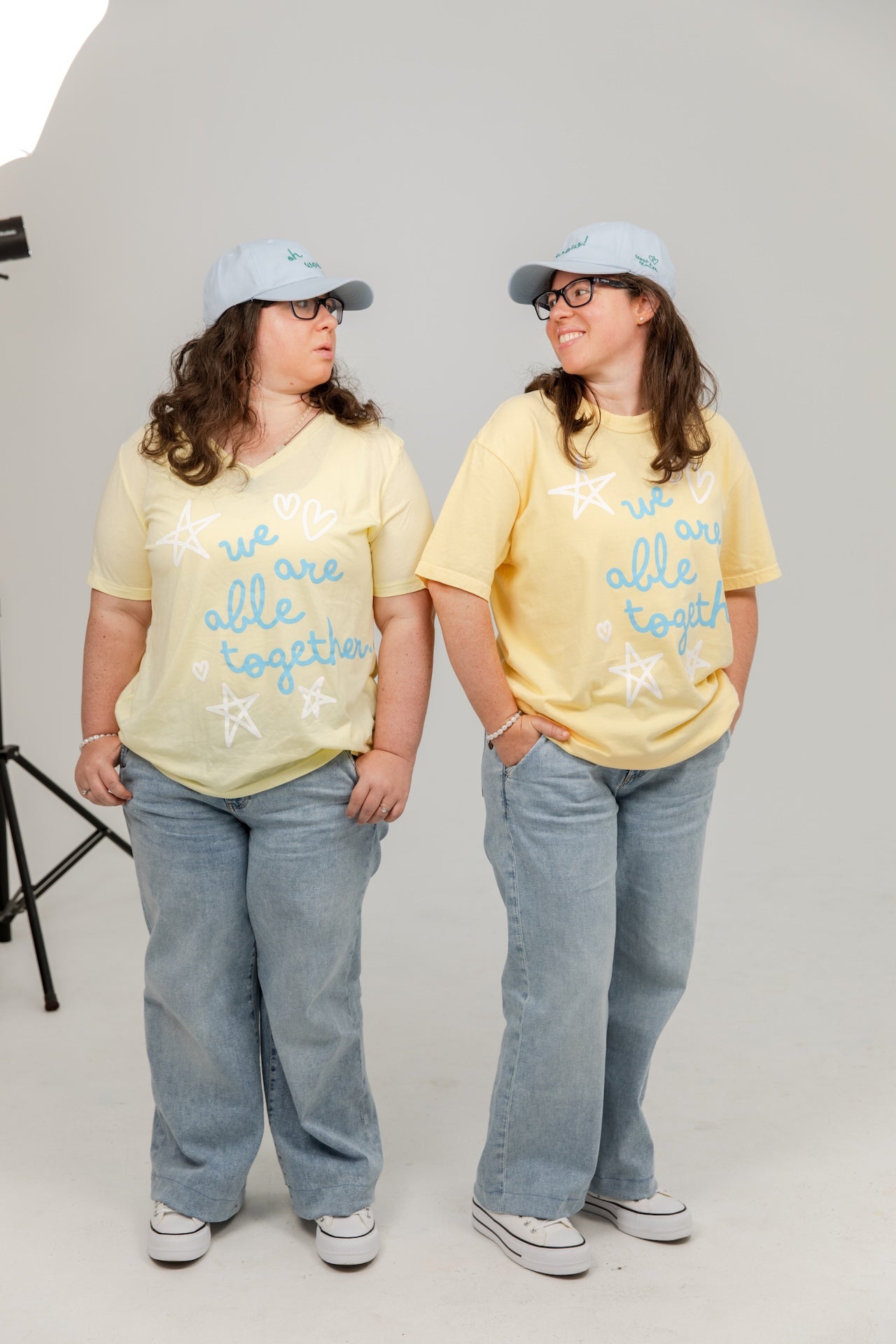 “We Are Able Together” Women’s V-Neck Tee – Pale Yellow