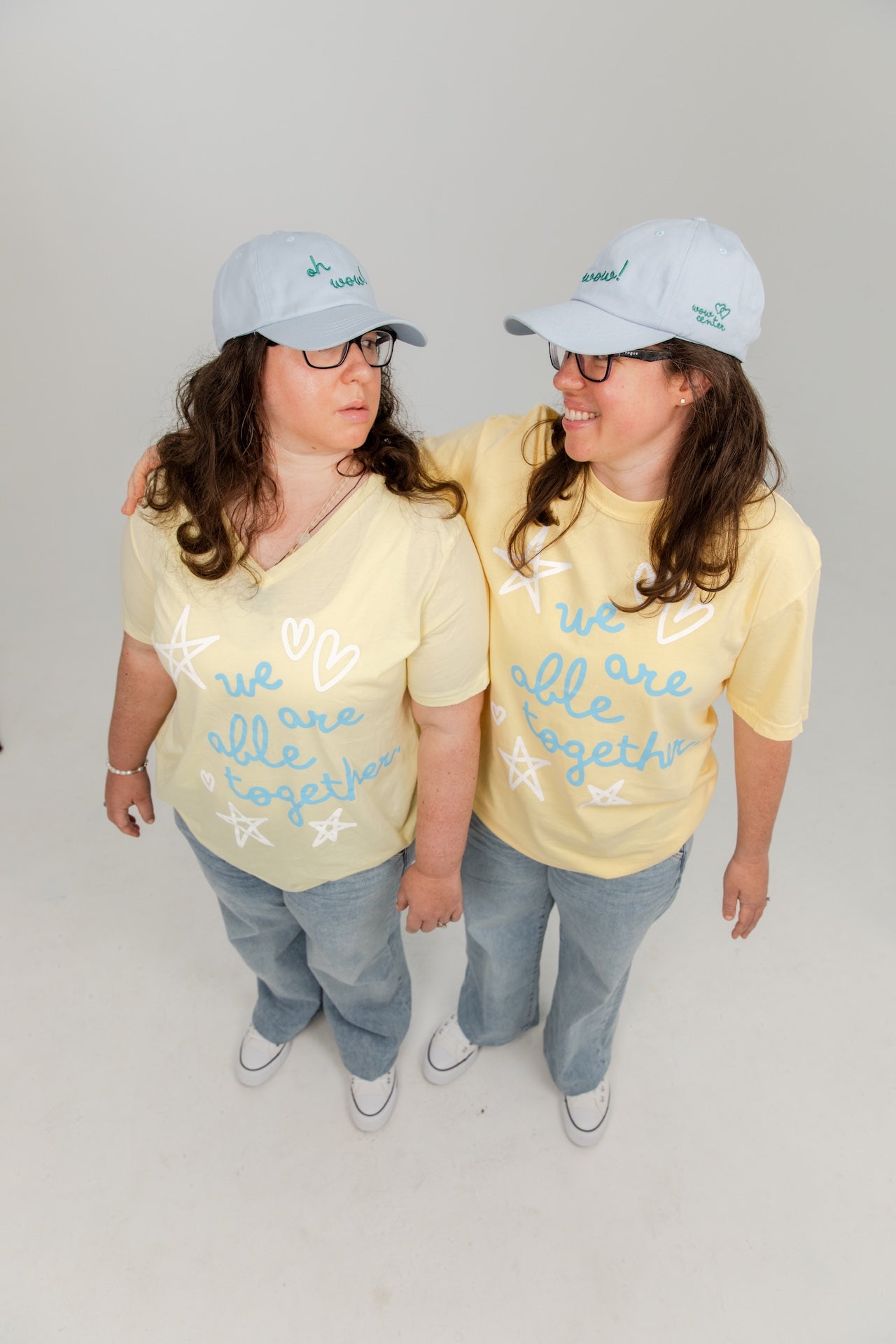 “We Are Able Together” Women’s V-Neck Tee – Pale Yellow